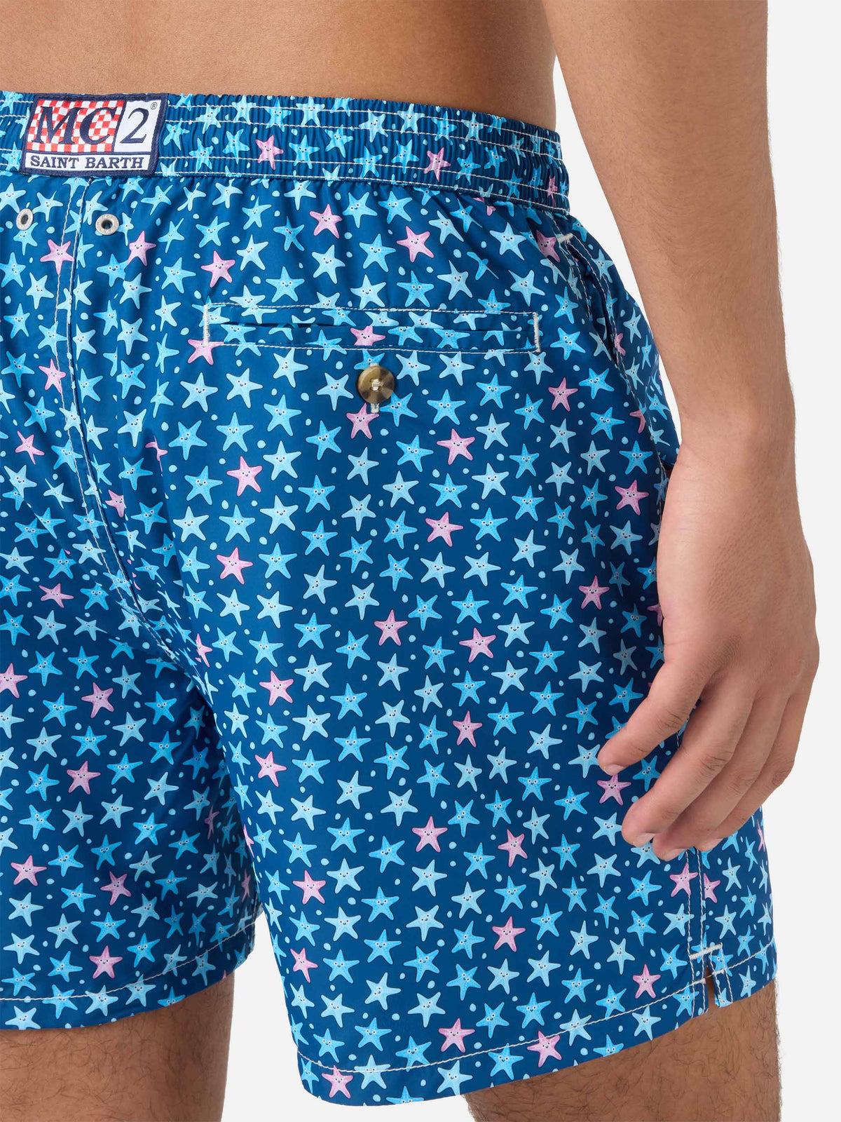 Costume mare Lighting Micro Fantasy con stampa stelle marine su fondo blu navy