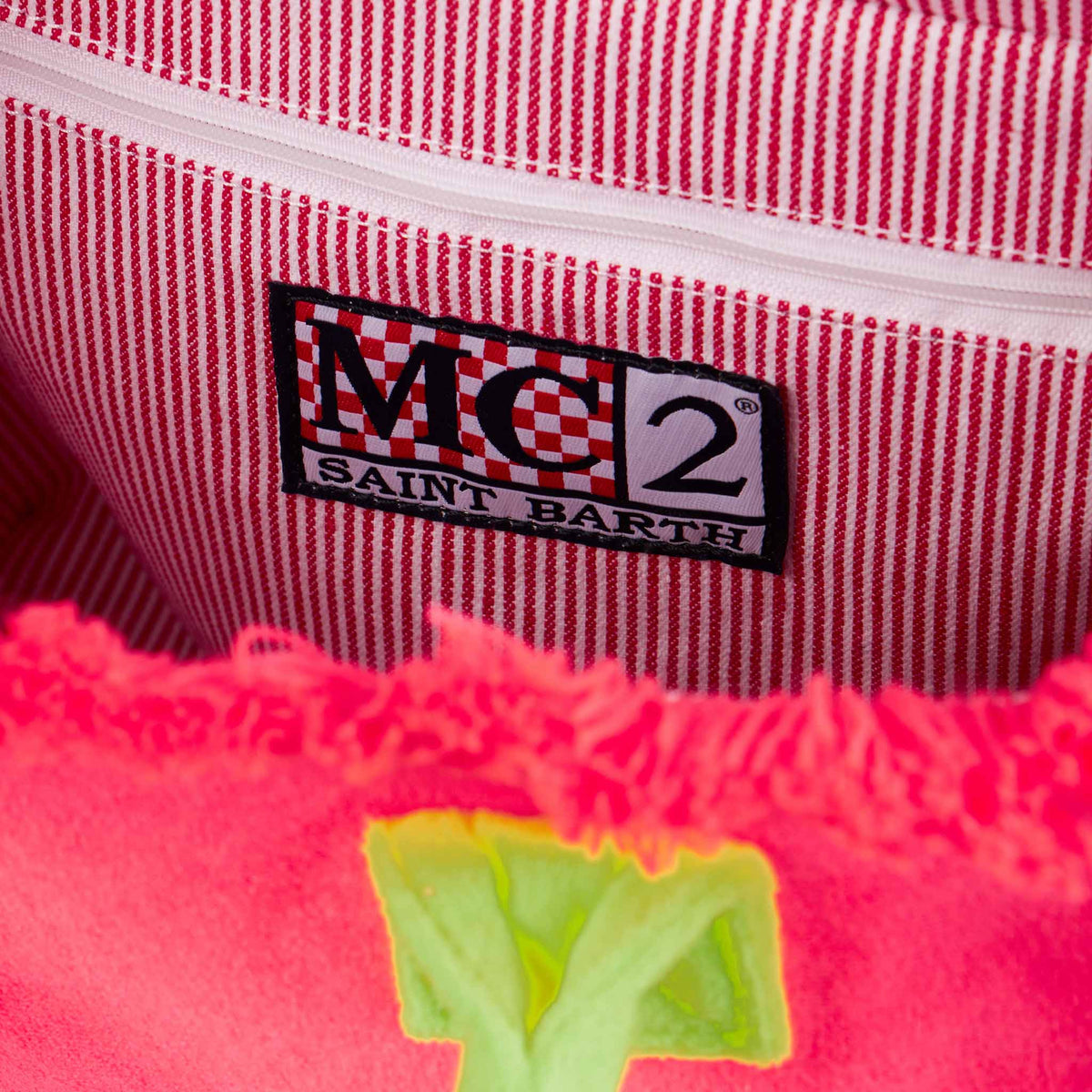 Borsa a mano Colette fucsia in spugna con frange